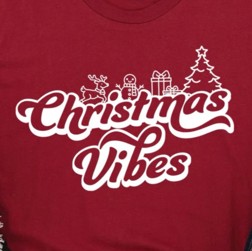 Christmas Vibes sweatshirt with simple white design featuring reindeer, gingerbread man, gift, and tree