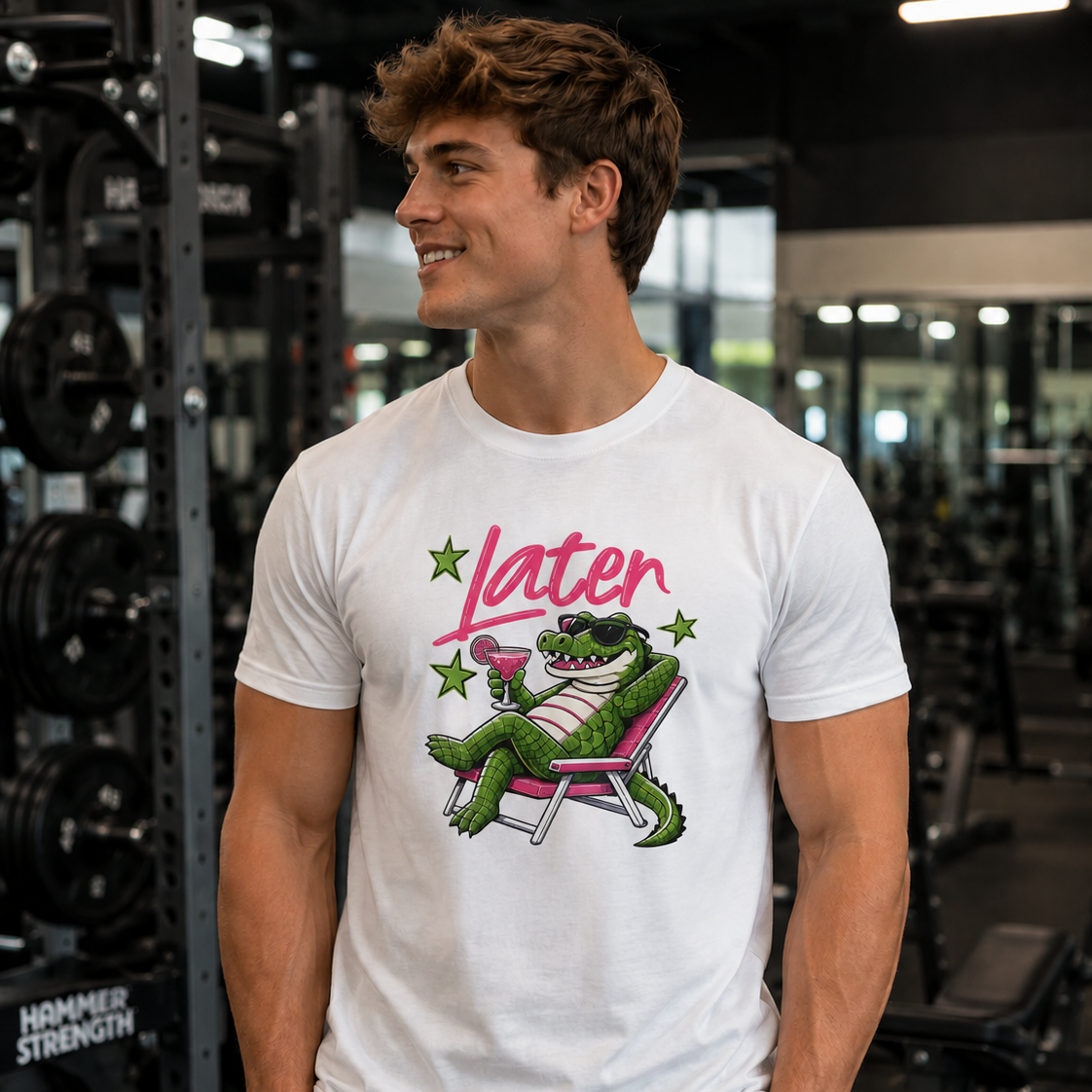 Person wearing a white t-shirt with a graphic design in a gym setting