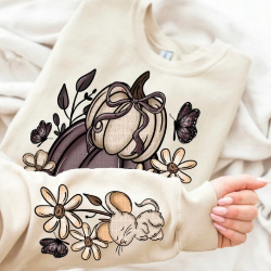 Cozy fall sweatshirt featuring a stack of pumpkins on the front and a cute mouse detail on the sleeve, perfect for autumn days.
