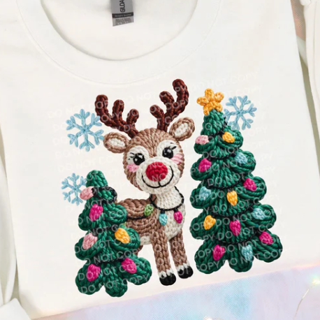 Festive youth sweatshirt with faux yarn reindeer and Christmas trees. Soft, cozy, and perfect for holiday celebrations.