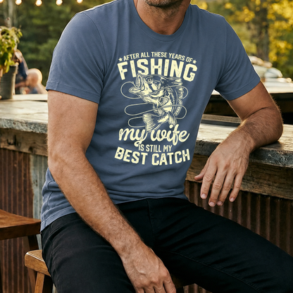 Fishing themed blue t-shirt with quote "After all of these years of fishing my wife is still my best catch" printed on a comfortable casual tee