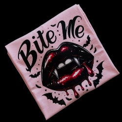 A pink 'Bite Me' T-shirt with a graphic of lips and bats