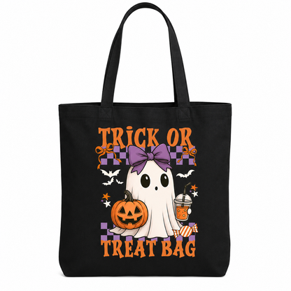 A black canvas tote bag featuring a colorful Halloween graphic with the text 'TRICK OR TREAT BAG', a cartoon ghost, a jack-o'-lantern, bats, stars, and a purple bow, shown on a plain white background.