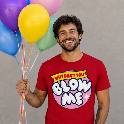 Man wearing a red t-shirt with a humorous graphic and text, holding colorful balloons.