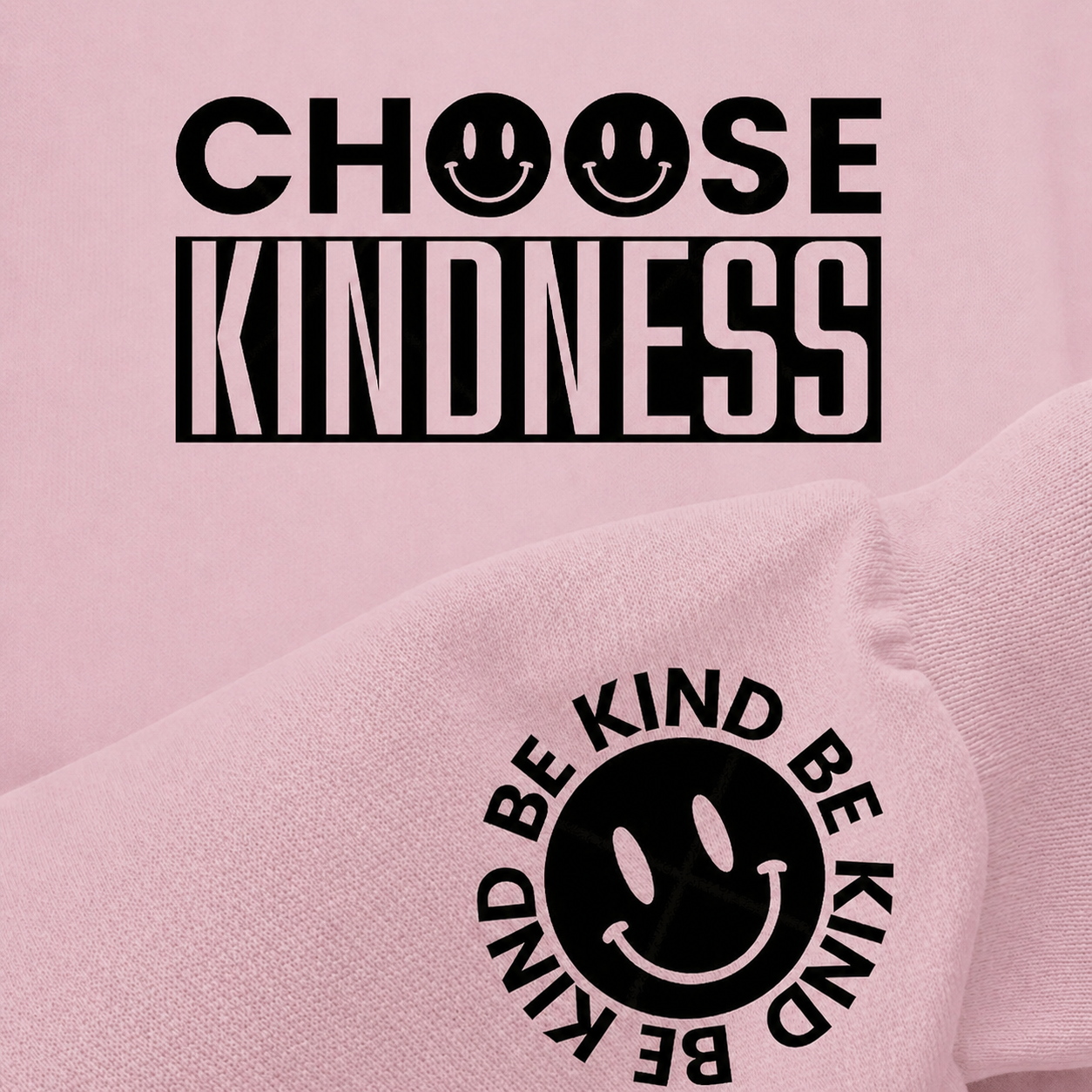 Light pink sweatshirt with 'Choose Kindness' text and smiley face design.