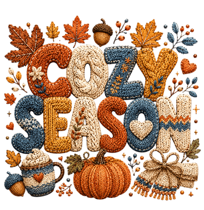 A cozy autumn-themed decorative graphic reading “COZY SEASON” in knitted letter shapes, surrounded by fall leaves, acorns, berries, a mug, a pumpkin, and a scarf on a white background.