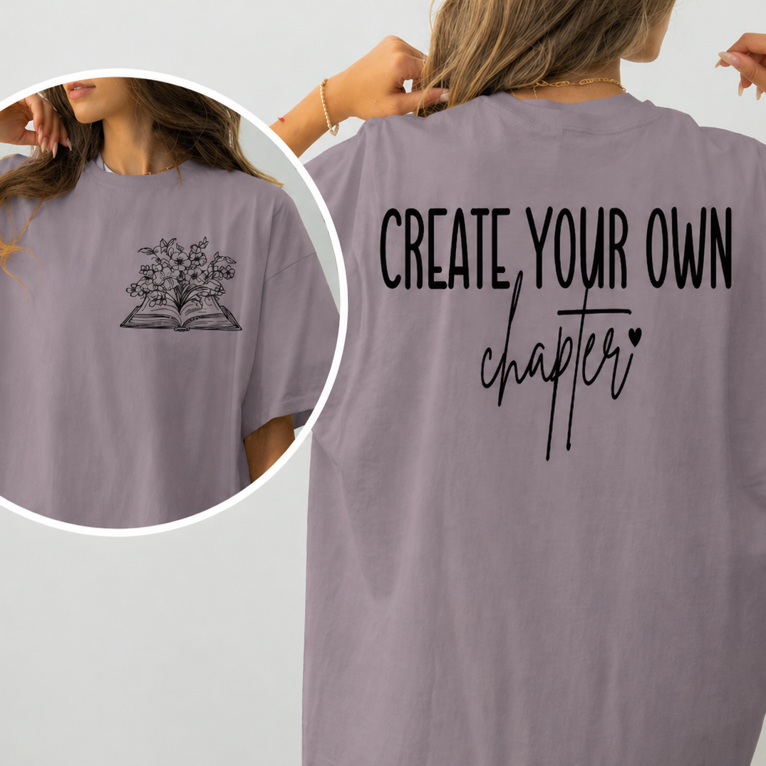 Paragon colored t-shirt with 'Create Your Own Chapter' text on the back, worn by a person.