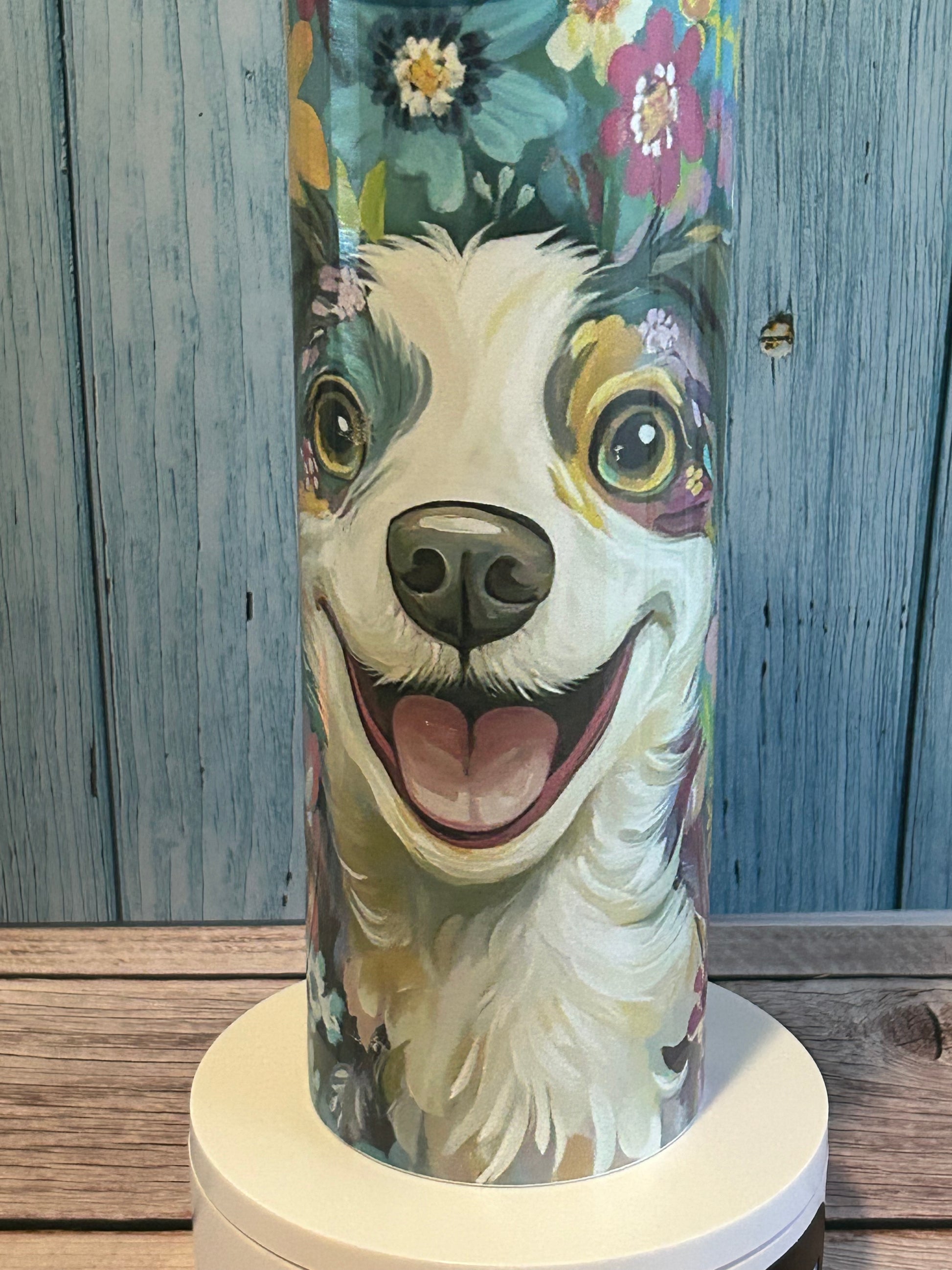 20oz tumbler featuring a cute dog design, double-wall vacuum insulated, with clear sliding lid and straw, perfect for hot or cold drinks.