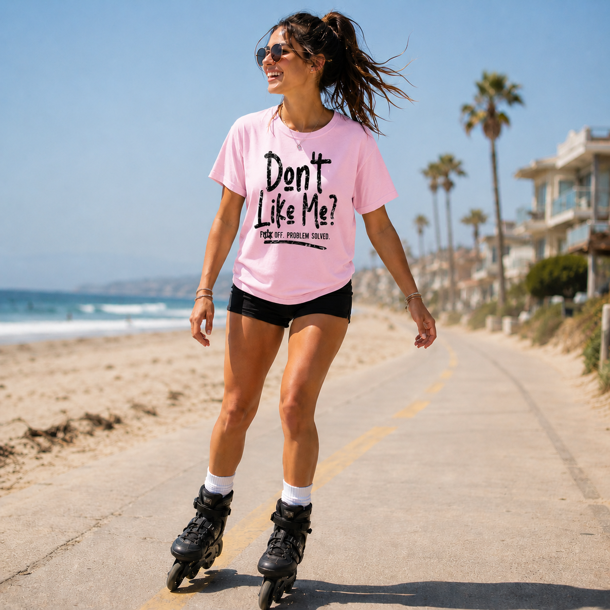 Woman wearing a blossom t-shirt with the text Don't like me? F off..problem solved