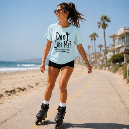 Woman wearing a chambray colored t-shirt with the text Don't like me? F off problem solved