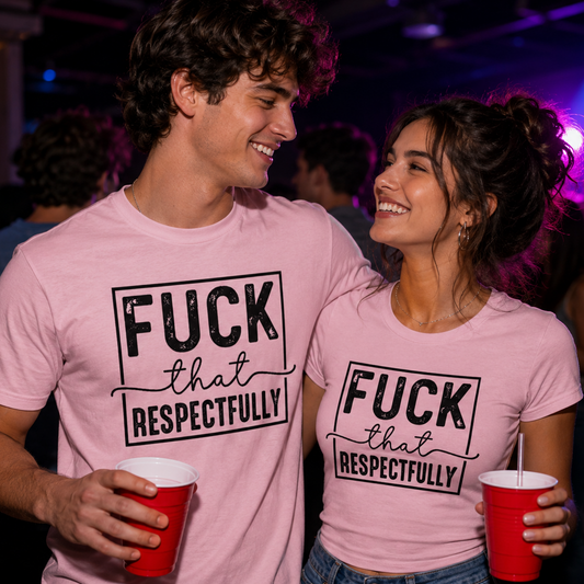 Two people wearing pink t-shirts with a humorous message, standing close together at a party.