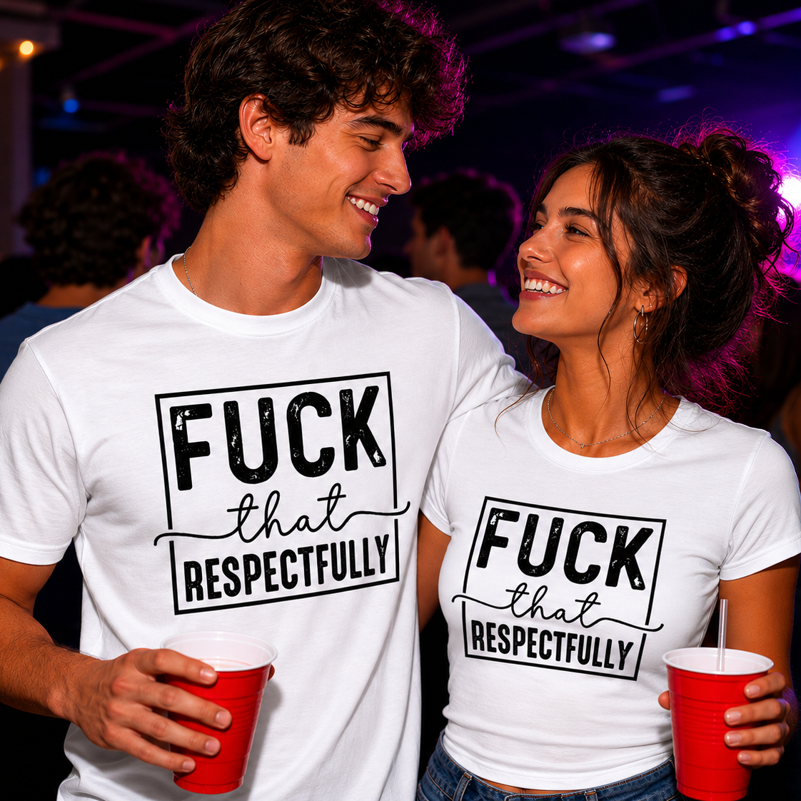 Two people wearing white t-shirts with black text at a party.