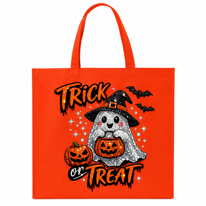 An orange canvas tote bag with a Halloween graphic featuring a glittery white ghost in a witch hat holding a jack-o'-lantern, with the text 'Trick or Treat' and small bats.