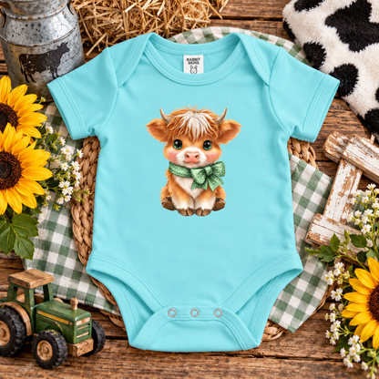 A Chill (blue) colored highland cow graphic design with a bow