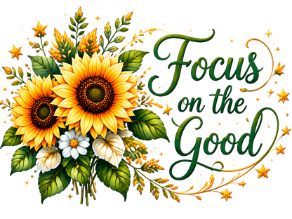 A decorative graphic with two large sunflowers, green leaves, small white flowers, and the phrase “Focus on the Good” in dark green script, surrounded by gold stars on a black background.