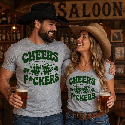 Two people wearing matching shirts with a humorous design in a bar setting.