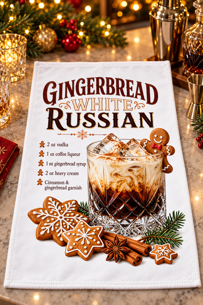 A white kitchen towel featuring a festive Christmas-themed recipe for 'Gingerbread White Russian' with graphic design of gingerbread cookies, a cocktail glass, cinnamon sticks, and pine branches, displayed on a marble countertop with holiday lights and shaker bottles in the background.