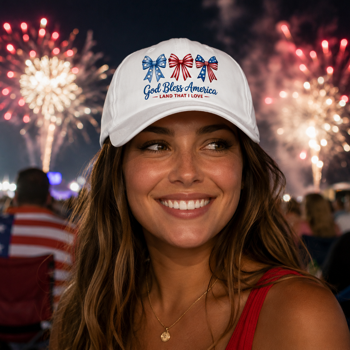 White patriotic dad hat featuring red white and blue bow graphics with God Bless America Land That I Love text design.