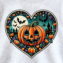 Cozy Halloween sweatshirt featuring a heart-shaped faux embroidery design with jack-o’-lantern, bats, moon, spider, and haunted house details.
