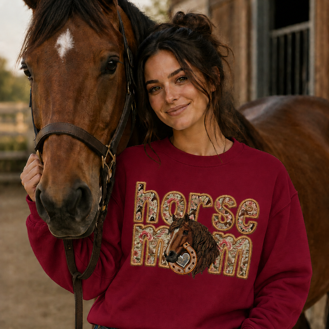 Woman wearing a 'horse mom' cardinal red colored sweatshirt standing next to a horse.