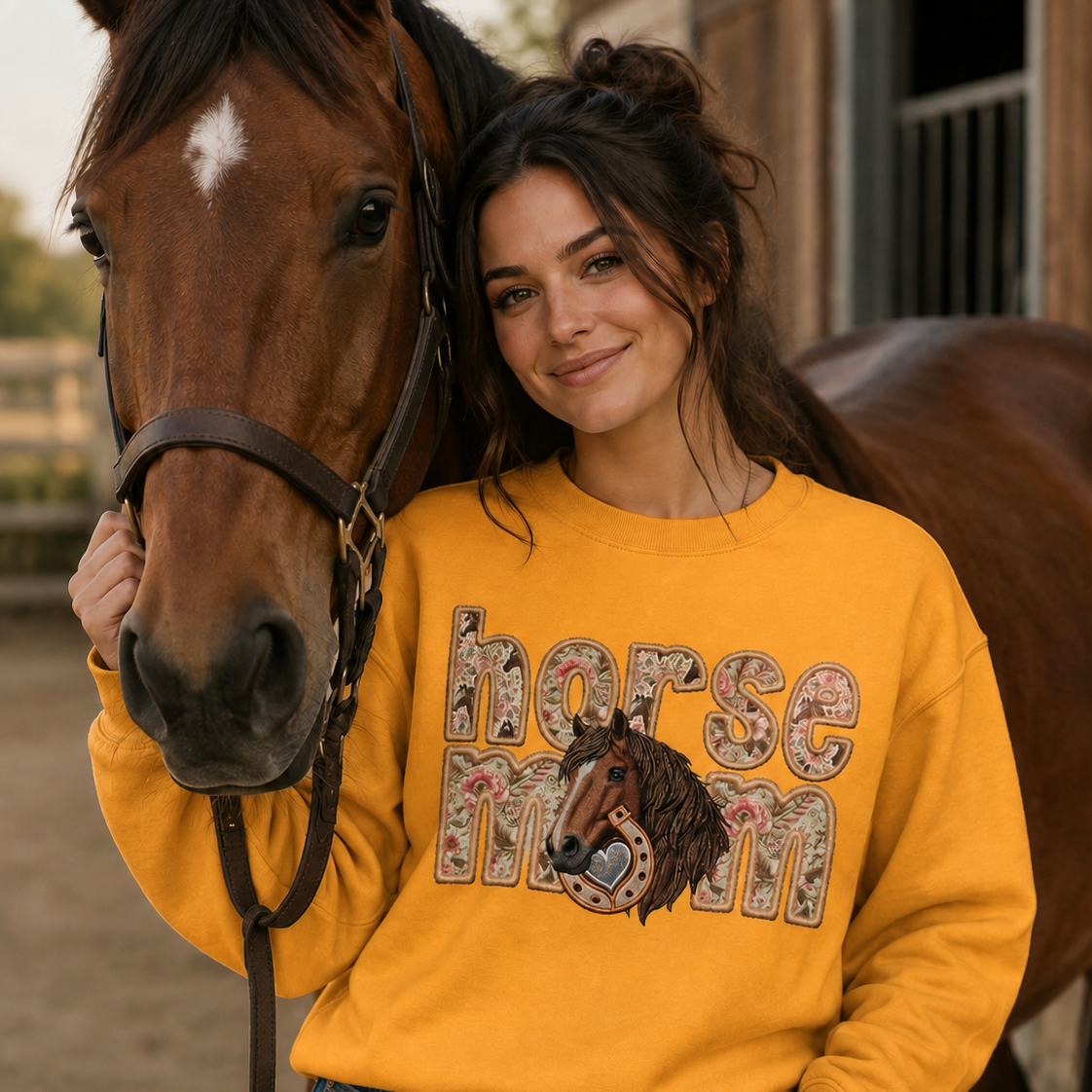 Woman wearing a gold colored 'horse mom' sweatshirt standing next to a horse.
