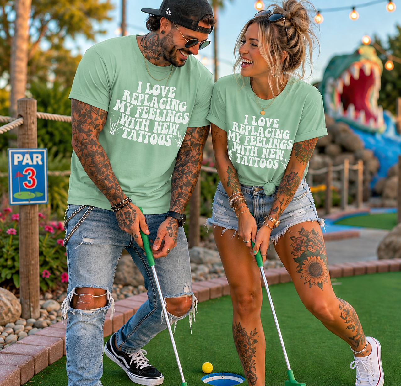People wearing a mint green colored  t-shirt with I love replacing my feelings with new tattoos white text design.