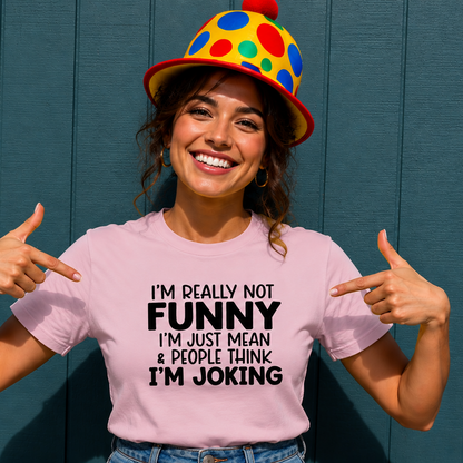 Person wearing a pink t-shirt with humorous text and a colorful clown hat against a blue background