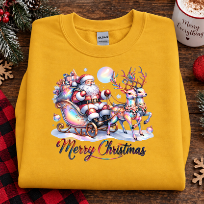 A folded yellow Gildan sweatshirt with a colorful Christmas graphic of Santa Claus in a sleigh with reindeer, displayed on a rustic wooden table with holiday decorations.