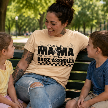 Woman sitting on a bench with two children, wearing a t-shirt with inappropriate text, in a park setting.
