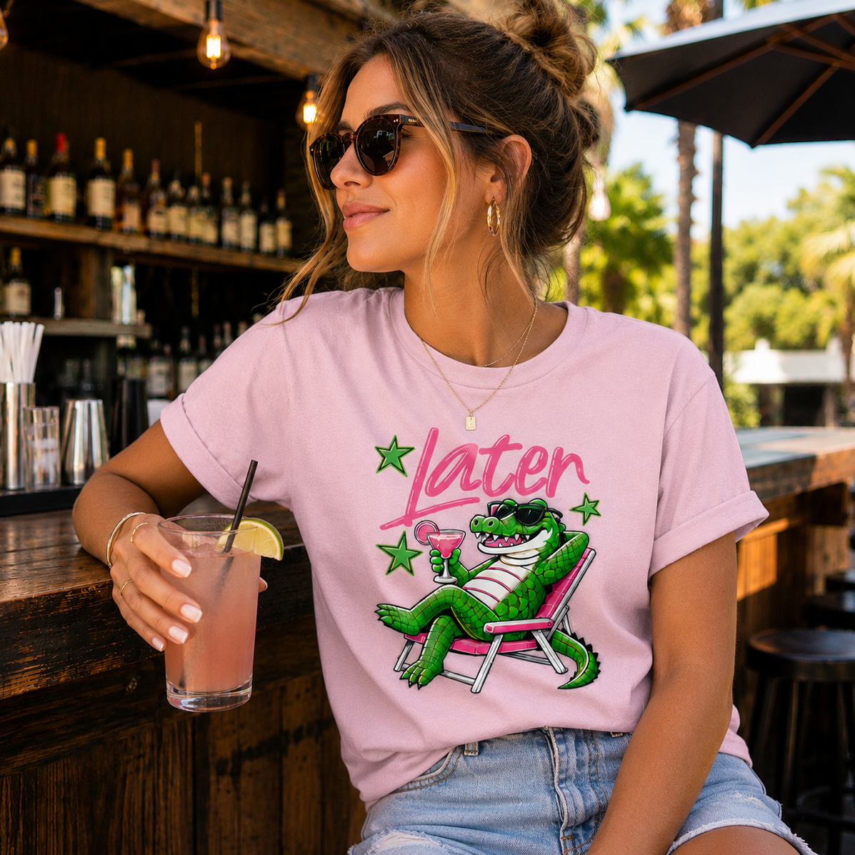 Pink retro “Later” margarita alligator graphic printed on a soft graphic t-shirt with neon stars and beach chair design.