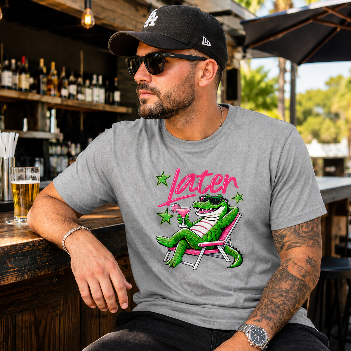 Gray retro “Later” margarita alligator graphic printed on a soft graphic t-shirt with neon stars and beach chair design.