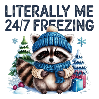 A cute illustrated raccoon wearing a blue knit beanie and matching scarf, standing in the snow with snow trees, gift boxes, and the text 'LITERALLY ME 24/7 FREEZING' above it.