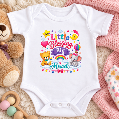 A white short-sleeve baby bodysuit The bodysuit features a colorful graphic that reads 'Little Blessing Big Miracle' with cartoon animals, stars, hearts, and a rainbow.