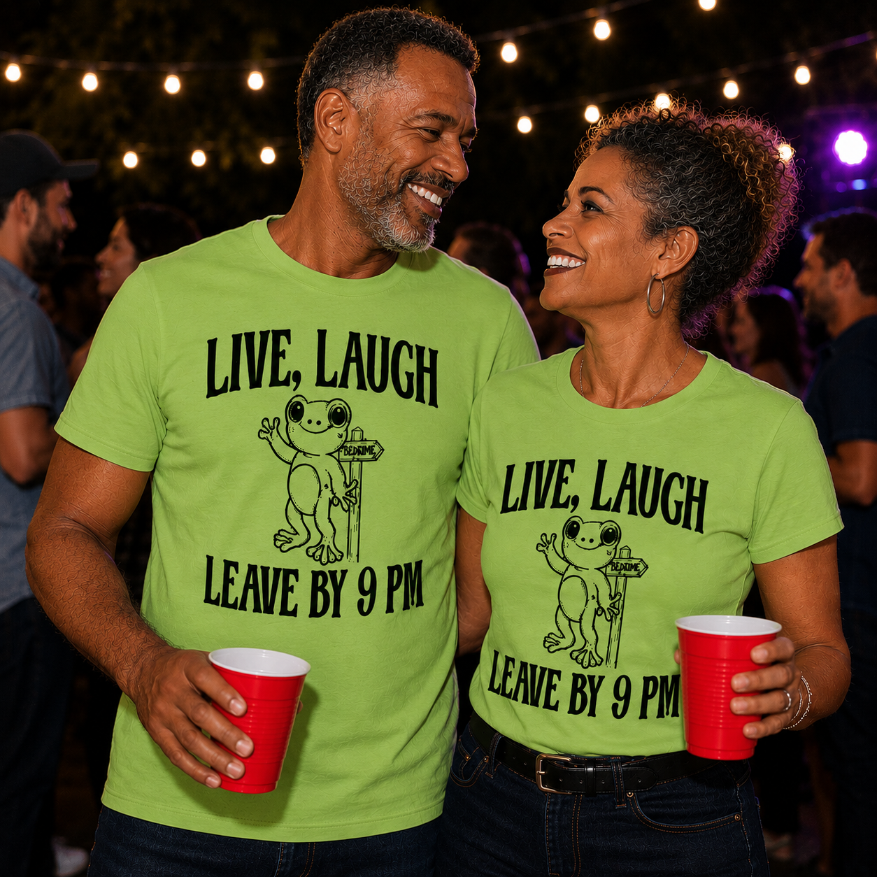 Two people wearing matching lime colored t-shirts with a frog graphic and text "Live, Laugh Leave by 9pm holding red cups in a social setting.