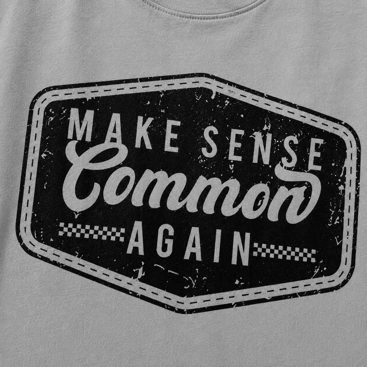 Gray sweatshirt with a black and white graphic and text 'Make Sense Common Again' on a gray background