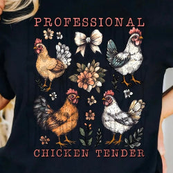 Graphic t-shirt featuring “Professional Chicken Tender” text with four cute chickens and floral accents, perfect for chicken enthusiasts.