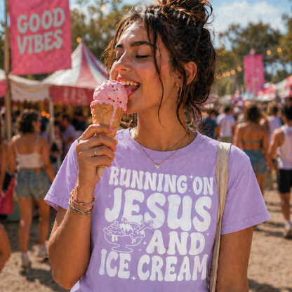 Girl wearing a orchid colored T-shirt with the graphic design Running on Jesus and Ice Cream