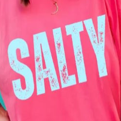 Bold, weathered, and made for beach souls. The Salty tee features a vintage distressed design and relaxed fit — perfect for ocean lovers with attitude.
