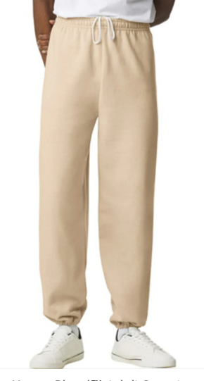 Beige sweatpants worn by a person on a white background