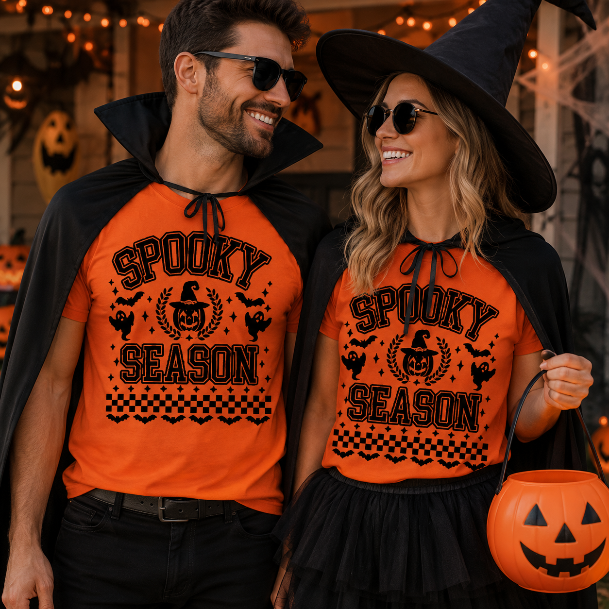 Man and woman wearing orange t-shirts with Spooky Season and graphic design