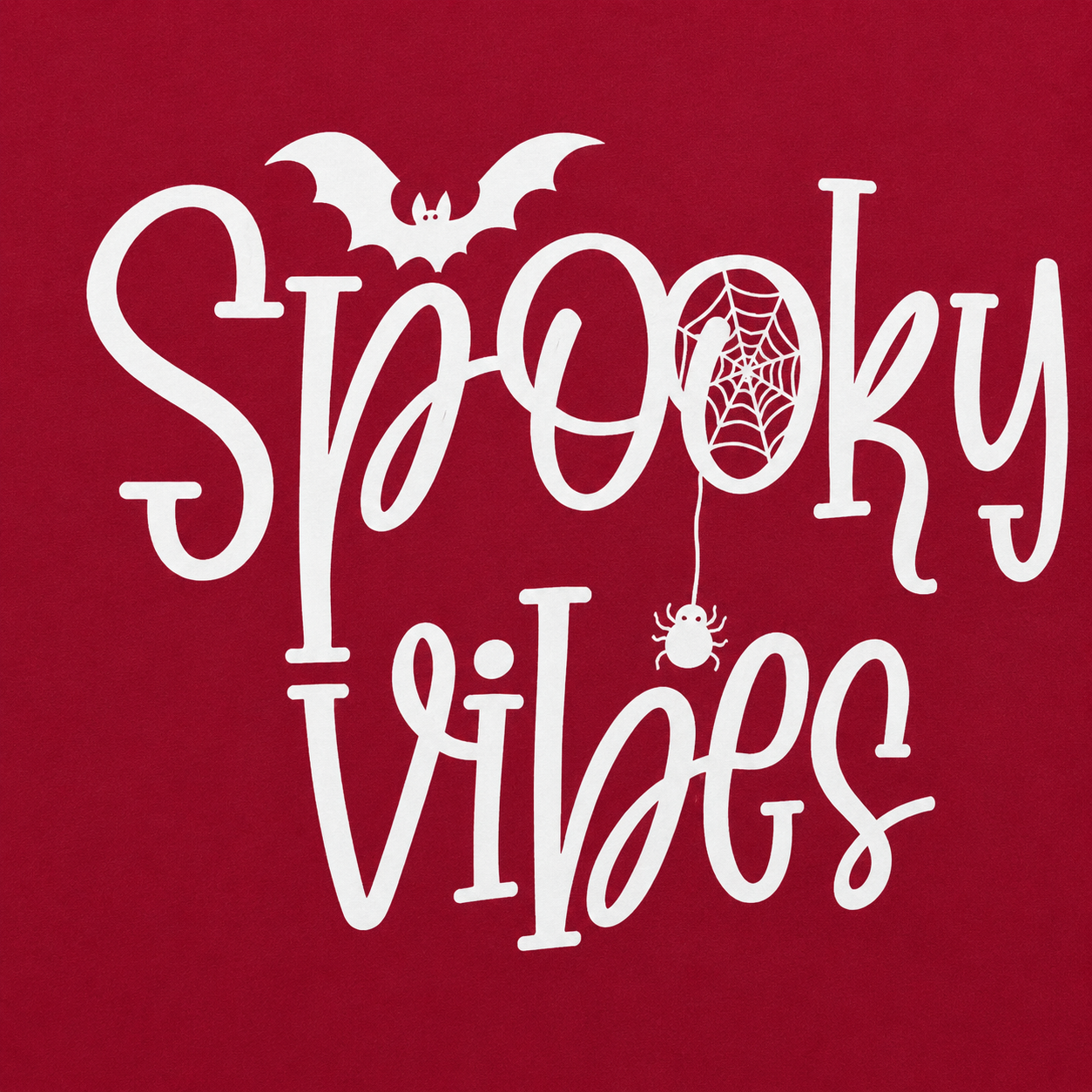 White 'Spooky Vibes' text with Halloween elements on a red background