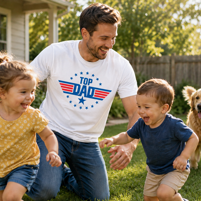 Man wearing a 'Top Dad' on a white colored t-shirt with two children and a dog in a backyard.