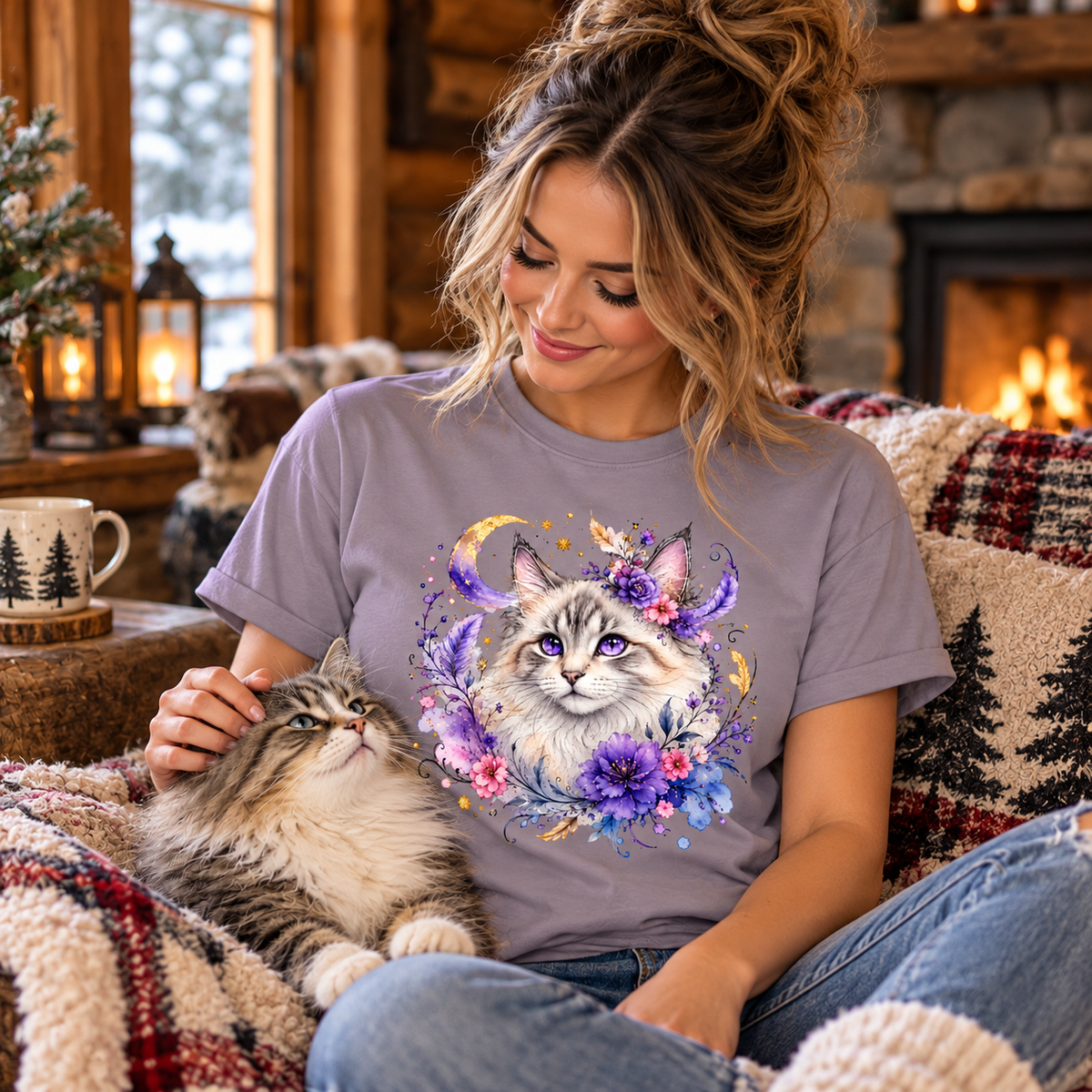 A woman wearing a paragon purple t-shirt with a silver tabby cat graphic with colorful flowers