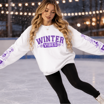 Woman wearing a white sweatshirt with Winter Vibes text in Purple with sleeve designs