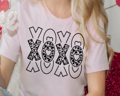 XOXO T-shirt with bold cheetah-print lettering, cute Valentine graphic design