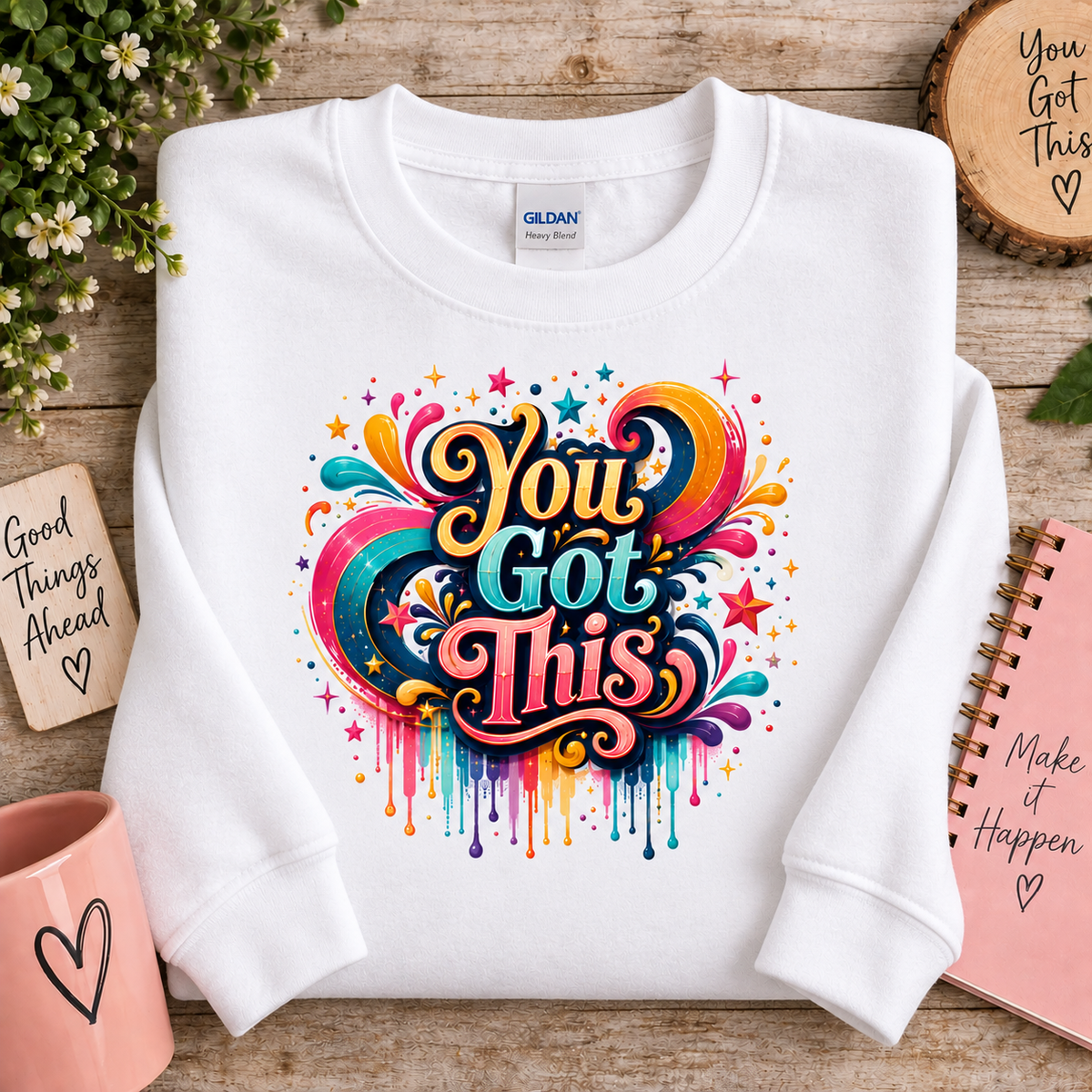 White gildan sweatshirt with a bright colored graphic with the words You Got This