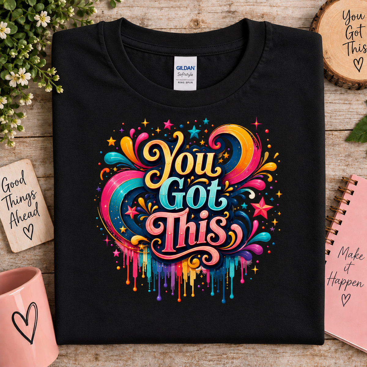 Black gildan t-shirt with a bright colored graphic with the words You Got This