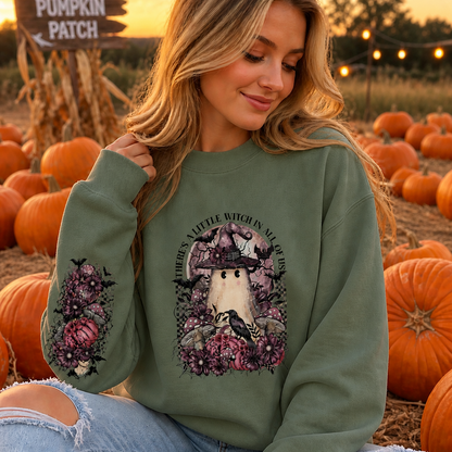 Sweatshirt with a graphic design of a ghost in a witch hat surrounded by flowers and text.