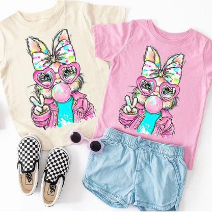 Bubblegum Bunny youth graphic t-shirt with bunny wearing heart shaped sunglasses denim jacket and peace sign