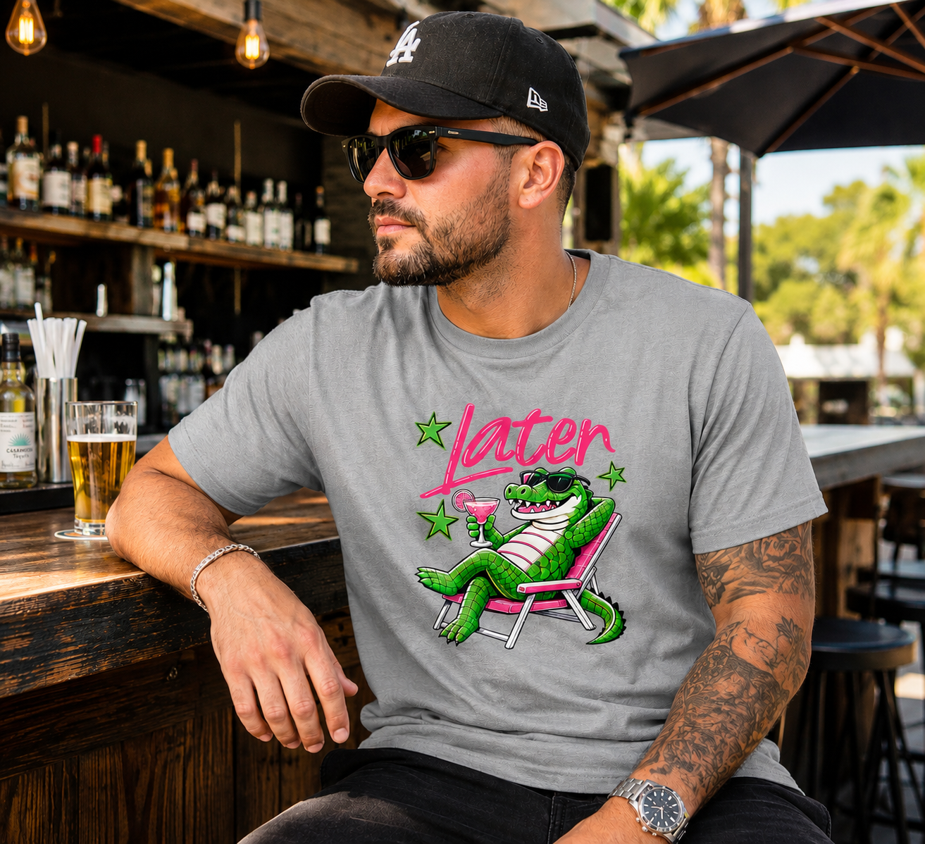 Gray retro “Later” margarita alligator graphic printed on a soft graphic t-shirt with neon stars and beach chair design.